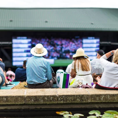 People watching tennis